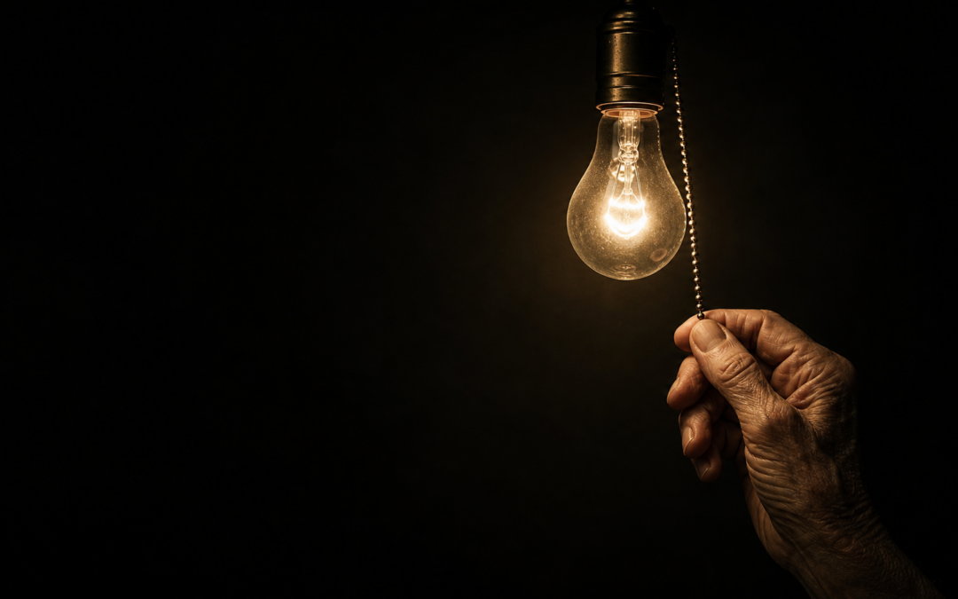 hand reaching for light bulb
